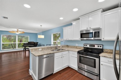 A rare find! This spacious 4-bedroom, 2.5-bath home with a 2-car on Stoneybrook Golf Club At Heritage Harbour in Florida - for sale on GolfHomes.com, golf home, golf lot