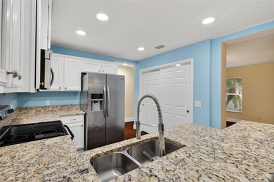 A rare find! This spacious 4-bedroom, 2.5-bath home with a 2-car on Stoneybrook Golf Club At Heritage Harbour in Florida - for sale on GolfHomes.com, golf home, golf lot