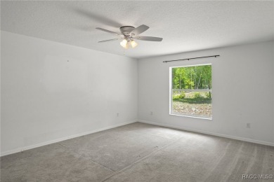 Located in the heart of Citrus Springs, 1574 W Lavender Lane on Citrus Springs Country Club in Florida - for sale on GolfHomes.com, golf home, golf lot