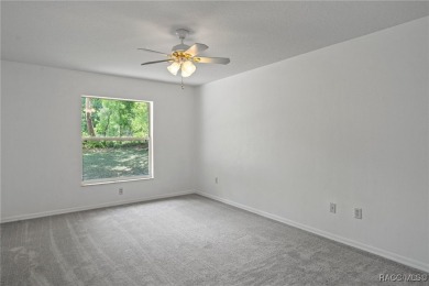 Located in the heart of Citrus Springs, 1574 W Lavender Lane on Citrus Springs Country Club in Florida - for sale on GolfHomes.com, golf home, golf lot