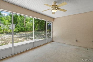 Located in the heart of Citrus Springs, 1574 W Lavender Lane on Citrus Springs Country Club in Florida - for sale on GolfHomes.com, golf home, golf lot