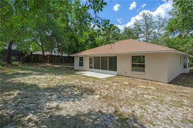 Located in the heart of Citrus Springs, 1574 W Lavender Lane on Citrus Springs Country Club in Florida - for sale on GolfHomes.com, golf home, golf lot