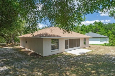 Located in the heart of Citrus Springs, 1574 W Lavender Lane on Citrus Springs Country Club in Florida - for sale on GolfHomes.com, golf home, golf lot