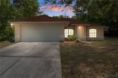 Located in the heart of Citrus Springs, 1574 W Lavender Lane on Citrus Springs Country Club in Florida - for sale on GolfHomes.com, golf home, golf lot