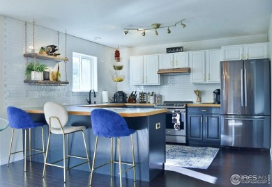 Charming 2-story home nestled near the Mariana Butte golf course on Mariana Butte Golf Course in Colorado - for sale on GolfHomes.com, golf home, golf lot