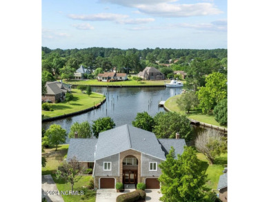 Boating enthusiasts rejoice! With deep water access just steps on Harbour Point Golf Club in North Carolina - for sale on GolfHomes.com, golf home, golf lot