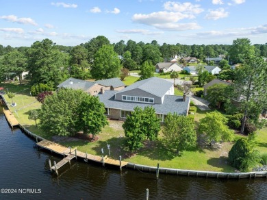 Boating enthusiasts rejoice! With deep water access just steps on Harbour Point Golf Club in North Carolina - for sale on GolfHomes.com, golf home, golf lot