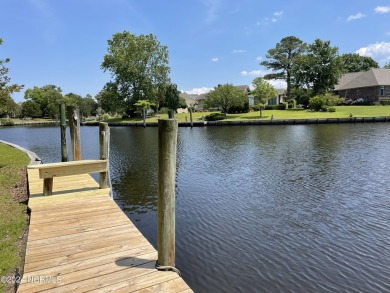 Boating enthusiasts rejoice! With deep water access just steps on Harbour Point Golf Club in North Carolina - for sale on GolfHomes.com, golf home, golf lot