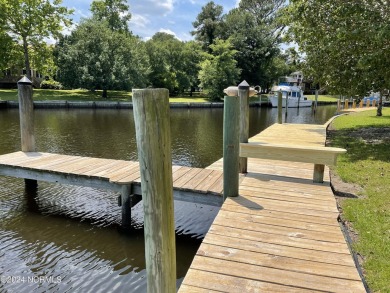 Boating enthusiasts rejoice! With deep water access just steps on Harbour Point Golf Club in North Carolina - for sale on GolfHomes.com, golf home, golf lot