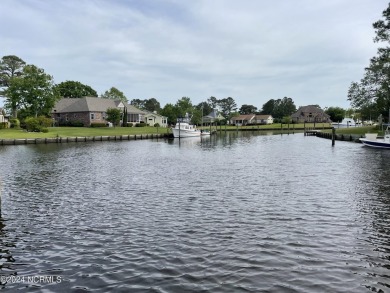 Boating enthusiasts rejoice! With deep water access just steps on Harbour Point Golf Club in North Carolina - for sale on GolfHomes.com, golf home, golf lot