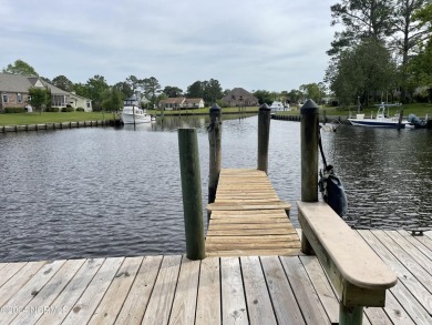 Boating enthusiasts rejoice! With deep water access just steps on Harbour Point Golf Club in North Carolina - for sale on GolfHomes.com, golf home, golf lot