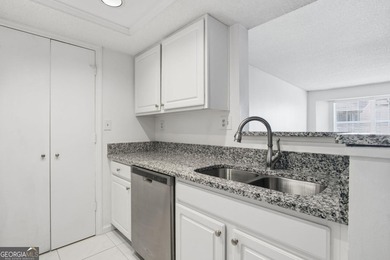 Perched on the top floor and overlooking the sparkling community on North Fulton Golf Course in Georgia - for sale on GolfHomes.com, golf home, golf lot