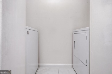 Perched on the top floor and overlooking the sparkling community on North Fulton Golf Course in Georgia - for sale on GolfHomes.com, golf home, golf lot