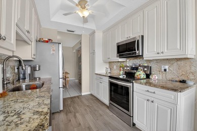 Stunning 3/2 corner unit coach home in the highly desired Boca on  in Florida - for sale on GolfHomes.com, golf home, golf lot