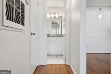 Perched on the top floor and overlooking the sparkling community on North Fulton Golf Course in Georgia - for sale on GolfHomes.com, golf home, golf lot