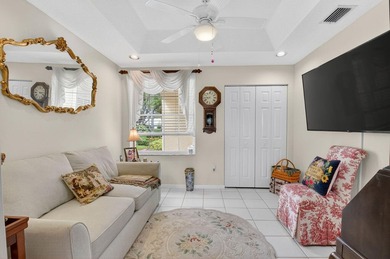 Stunning 3/2 corner unit coach home in the highly desired Boca on  in Florida - for sale on GolfHomes.com, golf home, golf lot