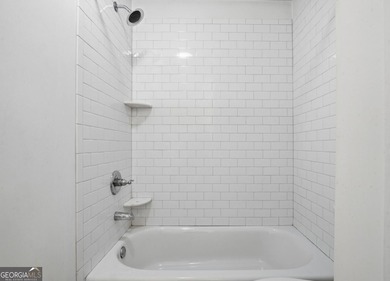 Perched on the top floor and overlooking the sparkling community on North Fulton Golf Course in Georgia - for sale on GolfHomes.com, golf home, golf lot