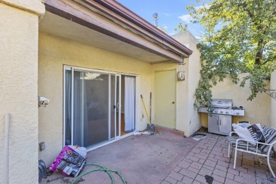 Discover this easy-to-maintain 2-bedroom, 2-bathroom patio home on Arroyo Del Oso Golf Course in New Mexico - for sale on GolfHomes.com, golf home, golf lot