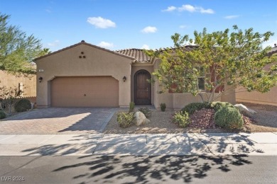 Experience resort-style elegance in this 3-bedroom, 2-bath home on Tuscany Golf Club in Nevada - for sale on GolfHomes.com, golf home, golf lot