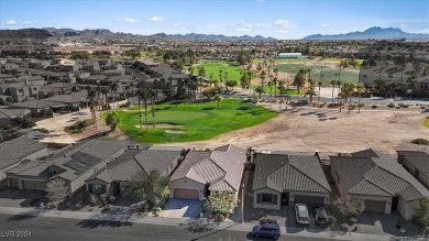 Experience resort-style elegance in this 3-bedroom, 2-bath home on Tuscany Golf Club in Nevada - for sale on GolfHomes.com, golf home, golf lot