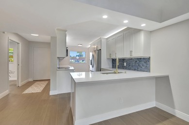 :Active adult communitypletely remodeled ground-floor unit with on Boca Dunes Golf and Country Club in Florida - for sale on GolfHomes.com, golf home, golf lot