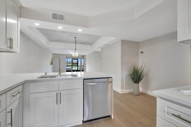 :Active adult communitypletely remodeled ground-floor unit with on Boca Dunes Golf and Country Club in Florida - for sale on GolfHomes.com, golf home, golf lot