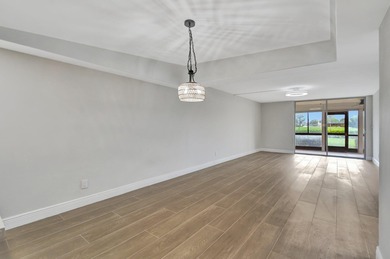 :Active adult communitypletely remodeled ground-floor unit with on Boca Dunes Golf and Country Club in Florida - for sale on GolfHomes.com, golf home, golf lot