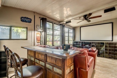 This unique two-bedroom, two-bath home in the gated, golf-course on Lake Fairways Country Club in Florida - for sale on GolfHomes.com, golf home, golf lot