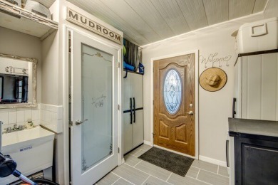 This unique two-bedroom, two-bath home in the gated, golf-course on Lake Fairways Country Club in Florida - for sale on GolfHomes.com, golf home, golf lot