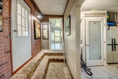 This unique two-bedroom, two-bath home in the gated, golf-course on Lake Fairways Country Club in Florida - for sale on GolfHomes.com, golf home, golf lot