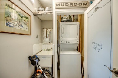This unique two-bedroom, two-bath home in the gated, golf-course on Lake Fairways Country Club in Florida - for sale on GolfHomes.com, golf home, golf lot