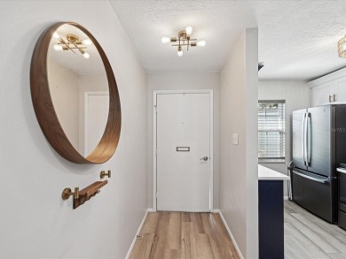 Completely updated, luxurious unit located within the gates of on Seven Springs Golf and Country Club in Florida - for sale on GolfHomes.com, golf home, golf lot