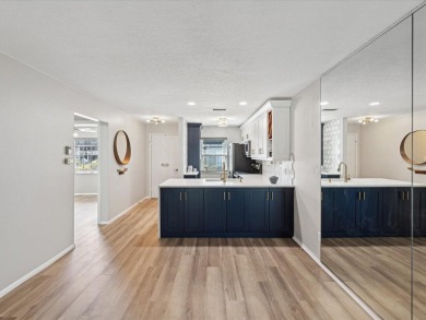 Completely updated, luxurious unit located within the gates of on Seven Springs Golf and Country Club in Florida - for sale on GolfHomes.com, golf home, golf lot