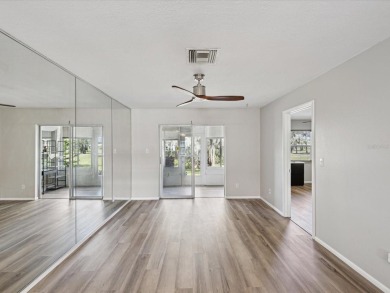 Completely updated, luxurious unit located within the gates of on Seven Springs Golf and Country Club in Florida - for sale on GolfHomes.com, golf home, golf lot