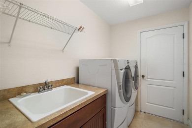 BOND PAID! ROOF 2021, HVAC 2020!  Popular 3/2 Gardenia with on The Links of Spruce Creek in Florida - for sale on GolfHomes.com, golf home, golf lot