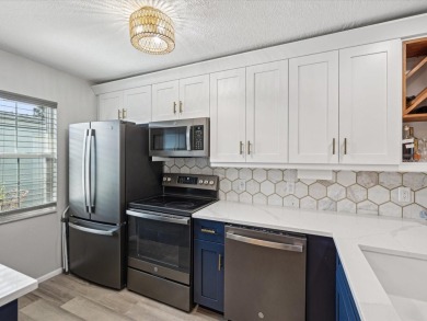 Completely updated, luxurious unit located within the gates of on Seven Springs Golf and Country Club in Florida - for sale on GolfHomes.com, golf home, golf lot