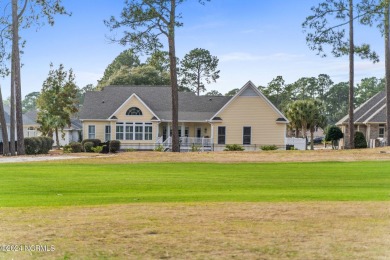 Classic Low Country home with inviting Rocking Chair front porch on Sea Trail Golf Resort in North Carolina - for sale on GolfHomes.com, golf home, golf lot