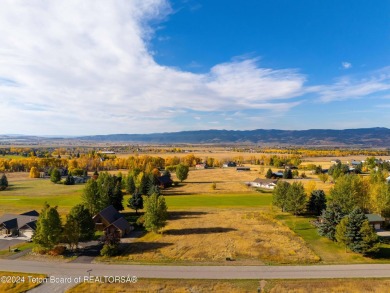 Two contiguous lots on the 10th fairway offer both beautiful on Cedar Creek Golf Course in Wyoming - for sale on GolfHomes.com, golf home, golf lot