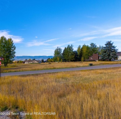 Two contiguous lots on the 10th fairway offer both beautiful on Cedar Creek Golf Course in Wyoming - for sale on GolfHomes.com, golf home, golf lot