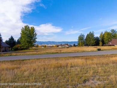 Two contiguous lots on the 10th fairway offer both beautiful on Cedar Creek Golf Course in Wyoming - for sale on GolfHomes.com, golf home, golf lot