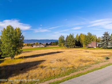 Two contiguous lots on the 10th fairway offer both beautiful on Cedar Creek Golf Course in Wyoming - for sale on GolfHomes.com, golf home, golf lot