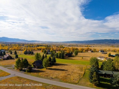 Two contiguous lots on the 10th fairway offer both beautiful on Cedar Creek Golf Course in Wyoming - for sale on GolfHomes.com, golf home, golf lot