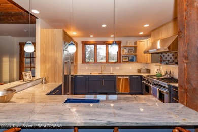 Don't miss this incredible opportunity to own a stunning custom on Jackson Hole Golf and Tennis Club in Wyoming - for sale on GolfHomes.com, golf home, golf lot