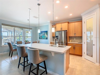 STUNNING & SPOTLESS CABELLA model with a heated Salt Water POOL on Stonegate Golf Club in Florida - for sale on GolfHomes.com, golf home, golf lot