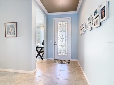 STUNNING & SPOTLESS CABELLA model with a heated Salt Water POOL on Stonegate Golf Club in Florida - for sale on GolfHomes.com, golf home, golf lot