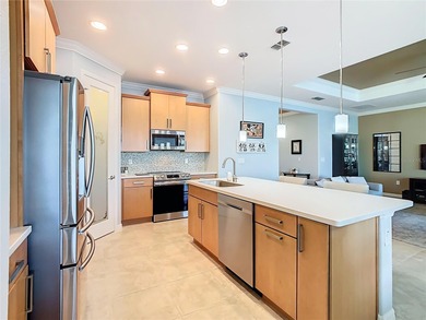 STUNNING & SPOTLESS CABELLA model with a heated Salt Water POOL on Stonegate Golf Club in Florida - for sale on GolfHomes.com, golf home, golf lot