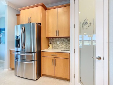 STUNNING & SPOTLESS CABELLA model with a heated Salt Water POOL on Stonegate Golf Club in Florida - for sale on GolfHomes.com, golf home, golf lot