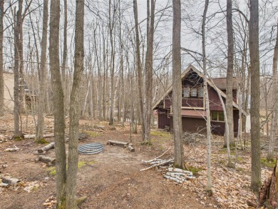 Welcome to this delightful 3-bedroom, 2-bath chalet packed with on Michaywe Pines Course in Michigan - for sale on GolfHomes.com, golf home, golf lot