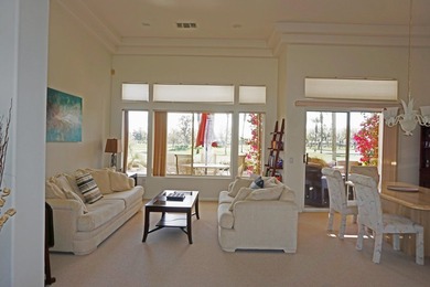 This Stunning Golf Course Emerald Model Is Perfectly Positioned on Mountain Vista Golf Course At Sun City Palm Desert in California - for sale on GolfHomes.com, golf home, golf lot