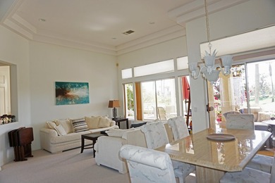 This Stunning Golf Course Emerald Model Is Perfectly Positioned on Mountain Vista Golf Course At Sun City Palm Desert in California - for sale on GolfHomes.com, golf home, golf lot